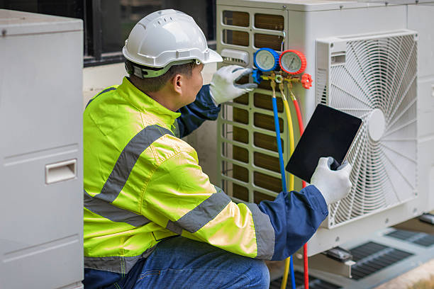 Professional Air Duct Cleaning technician working in Milwaukee, WI